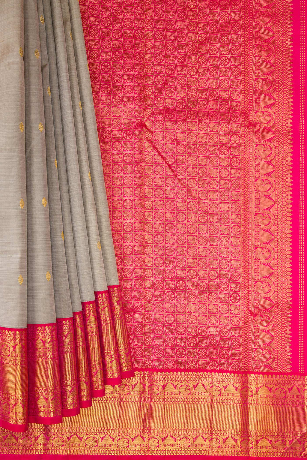 Pleats and pallu of Pure Silk Grey Kanjivaram Saree with Zari Butta on the body and Zari Border. 