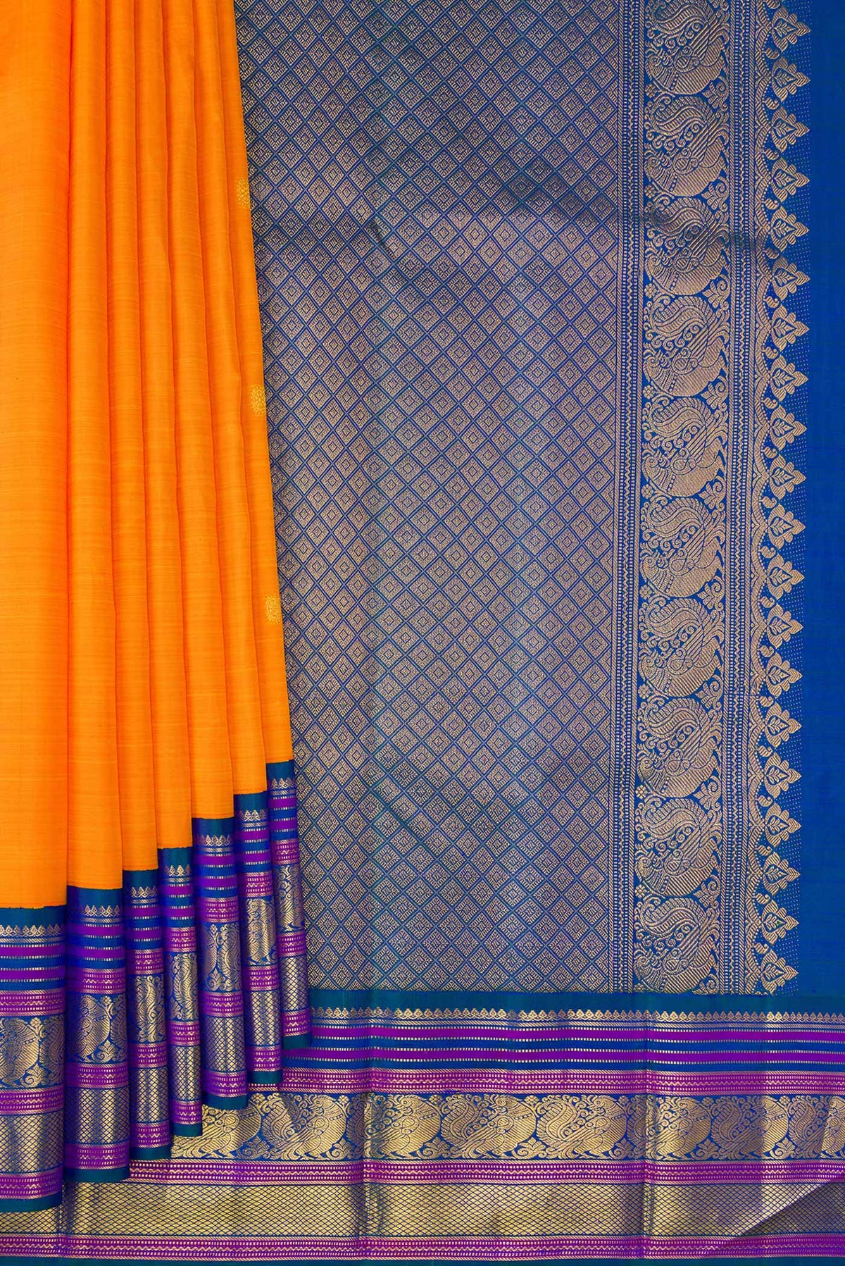 Pleats and pallu of Pure Silk Orange Dual Tone Kanjivaram Saree with Zari Butta on the body and Zari Border. 
