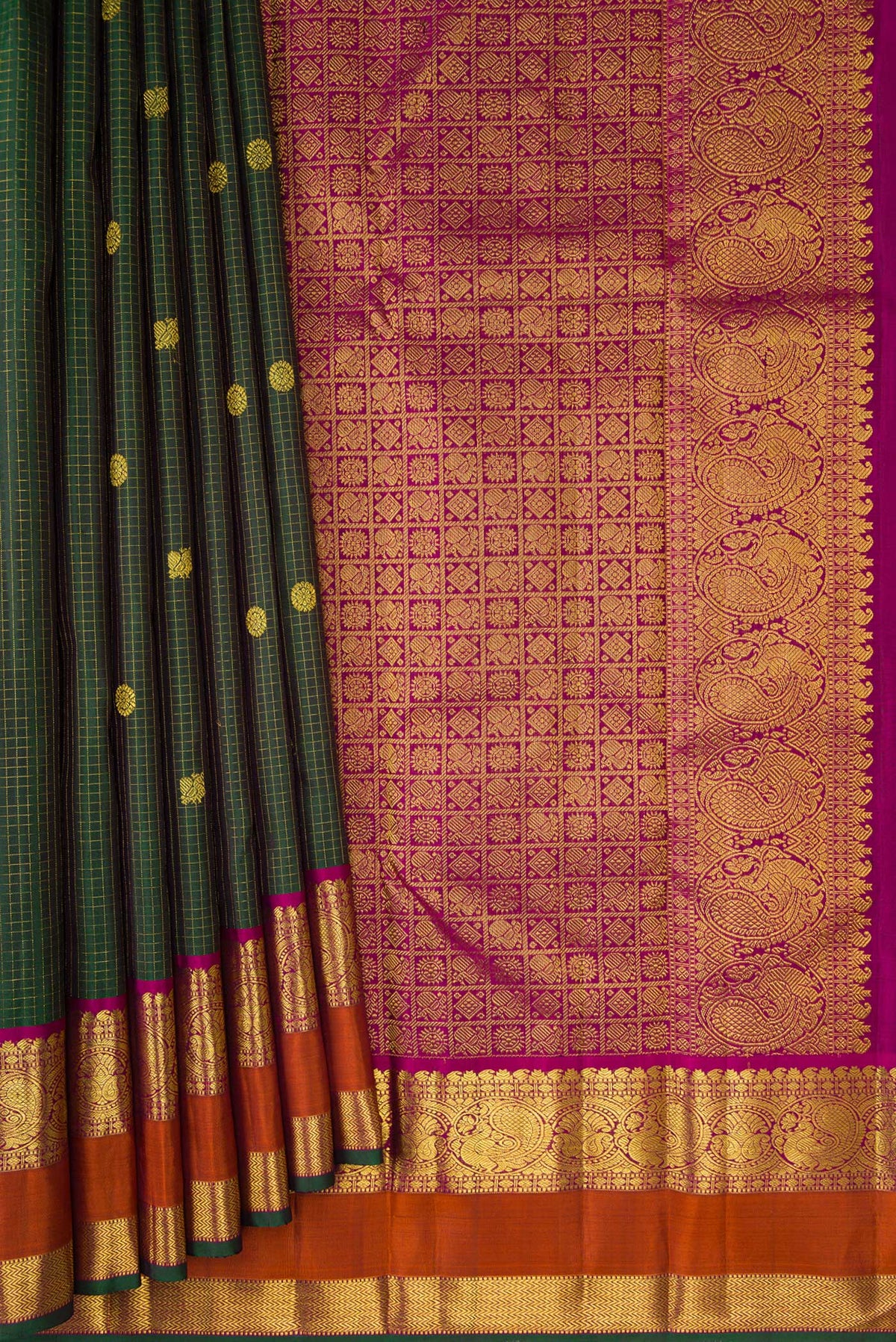 Pleats and pallu of Pure Silk Green Kanjivaram Saree with Checked design on the body and Zari Border. 