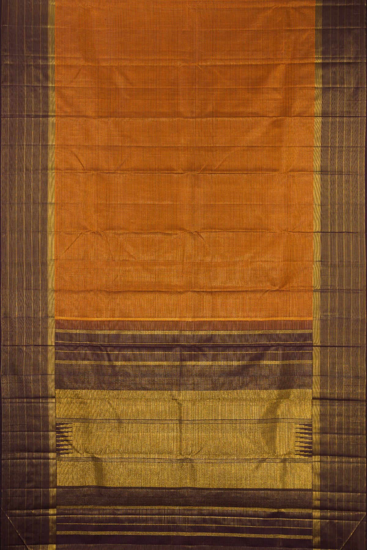 Flat view of Pure Silk Brick Orange Kanchipuram Saree with Checked design on the body and Zari Border. 