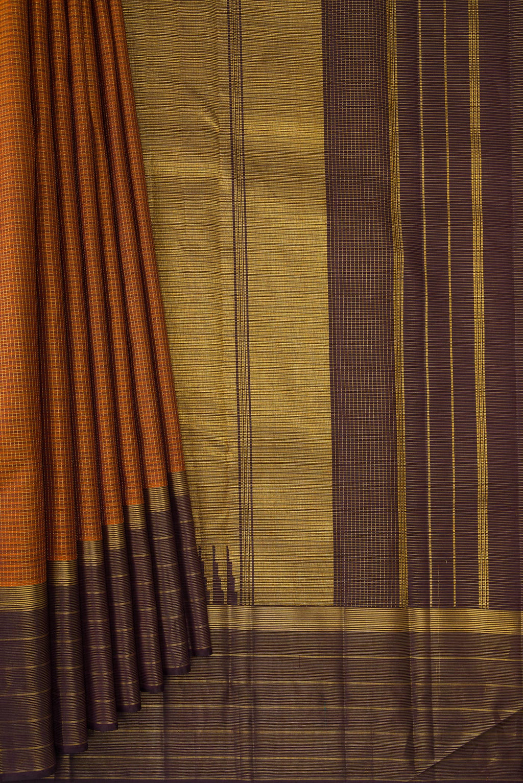 Pleats and pallu of Pure Silk Brick Orange Kanchipuram Saree with Checked design on the body and Zari Border. 
