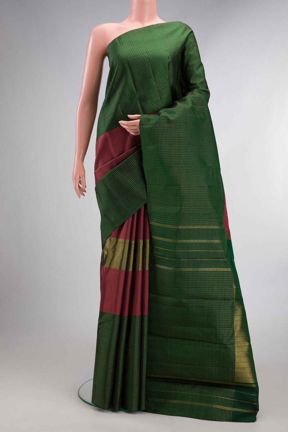 Pure Silk Multi Color Kanjivaram Saree with Checked design on the body and Without Border.  displayed on a mannequin