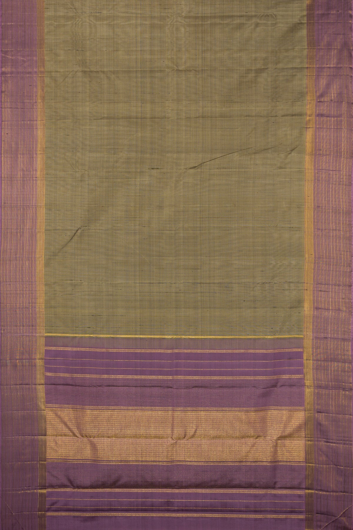 Flat view of Pure Silk Green Kanjivaram Saree with Plain Body and Zari Border. 