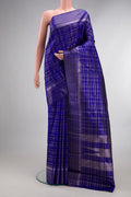 Pure Silk Royal Blue Kanjivaram Saree with Checked design on the body and Fancy Border.  displayed on a mannequin