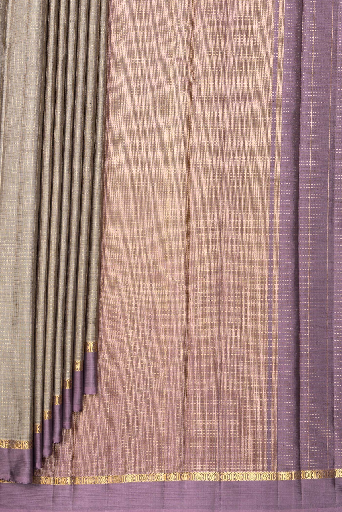 Pleats and pallu of Pure Silk Grey Kanjivaram Saree with Checked design on the body and Zari Border. 