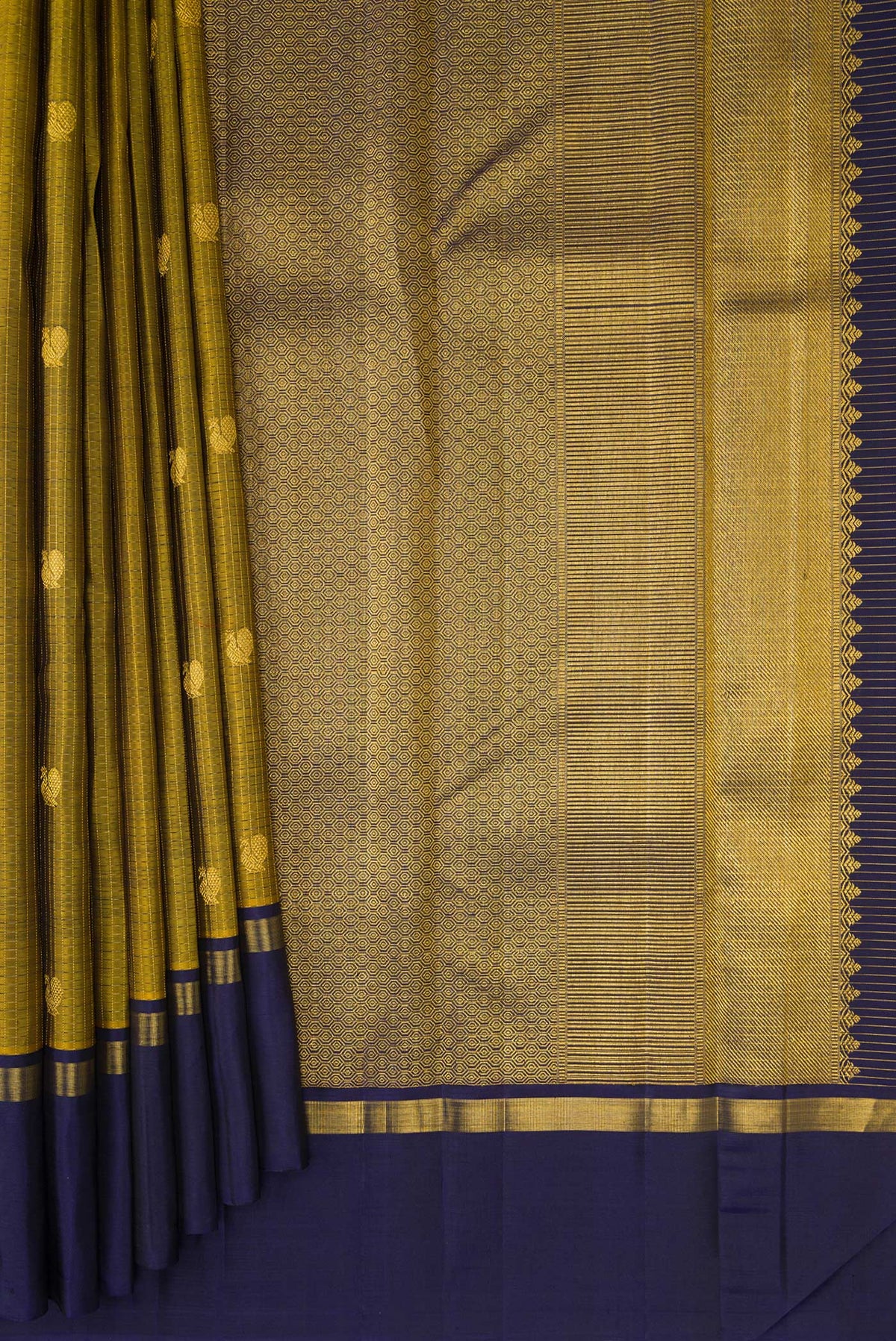 Pleats and pallu of Pure Silk Mehandi Green Kanjivaram Saree with Zari Butta on the body and Plain Border. 