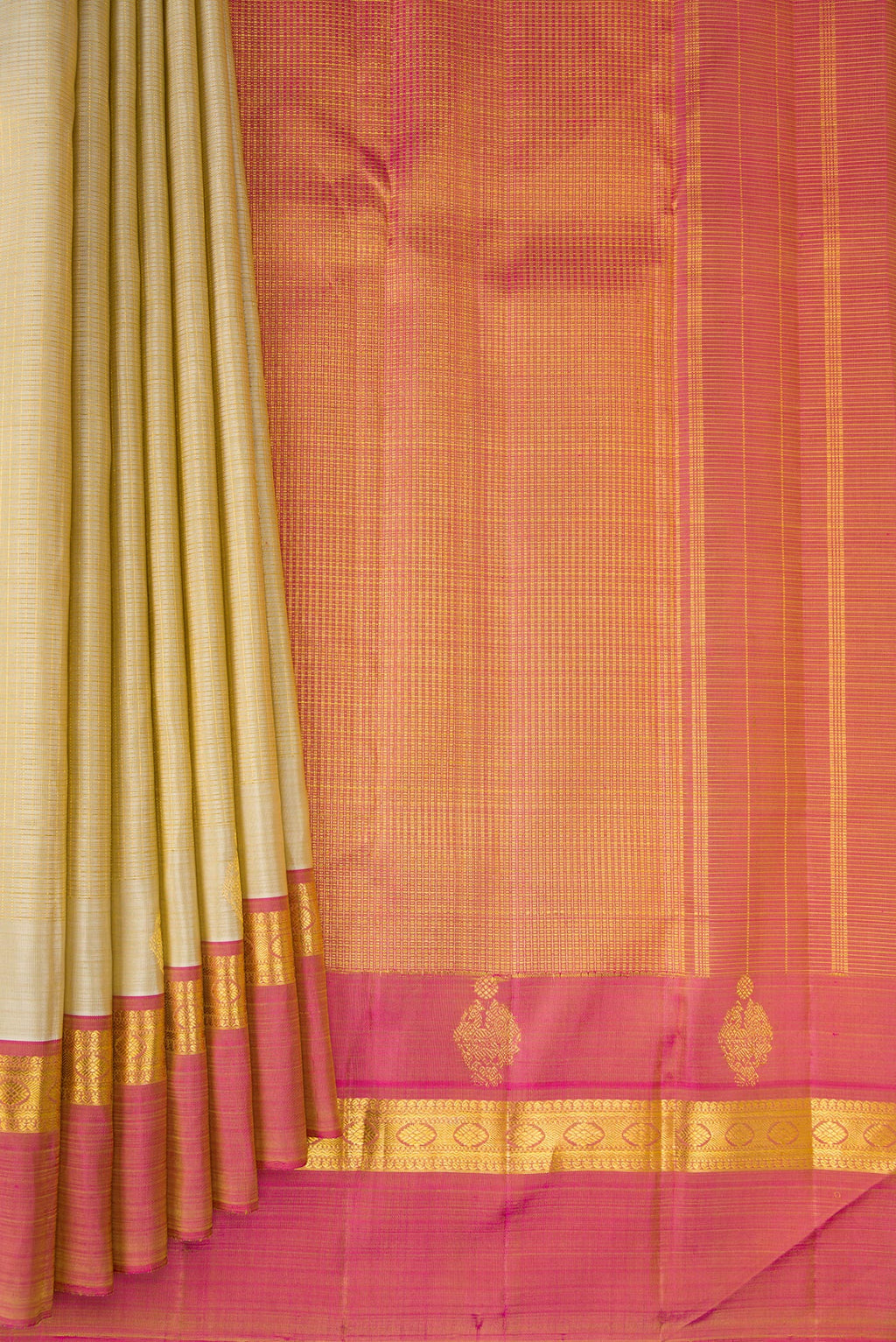 Pleats and pallu of Pure Silk Beige Kanjivaram Saree with Checked design on the body and Zari Border. 