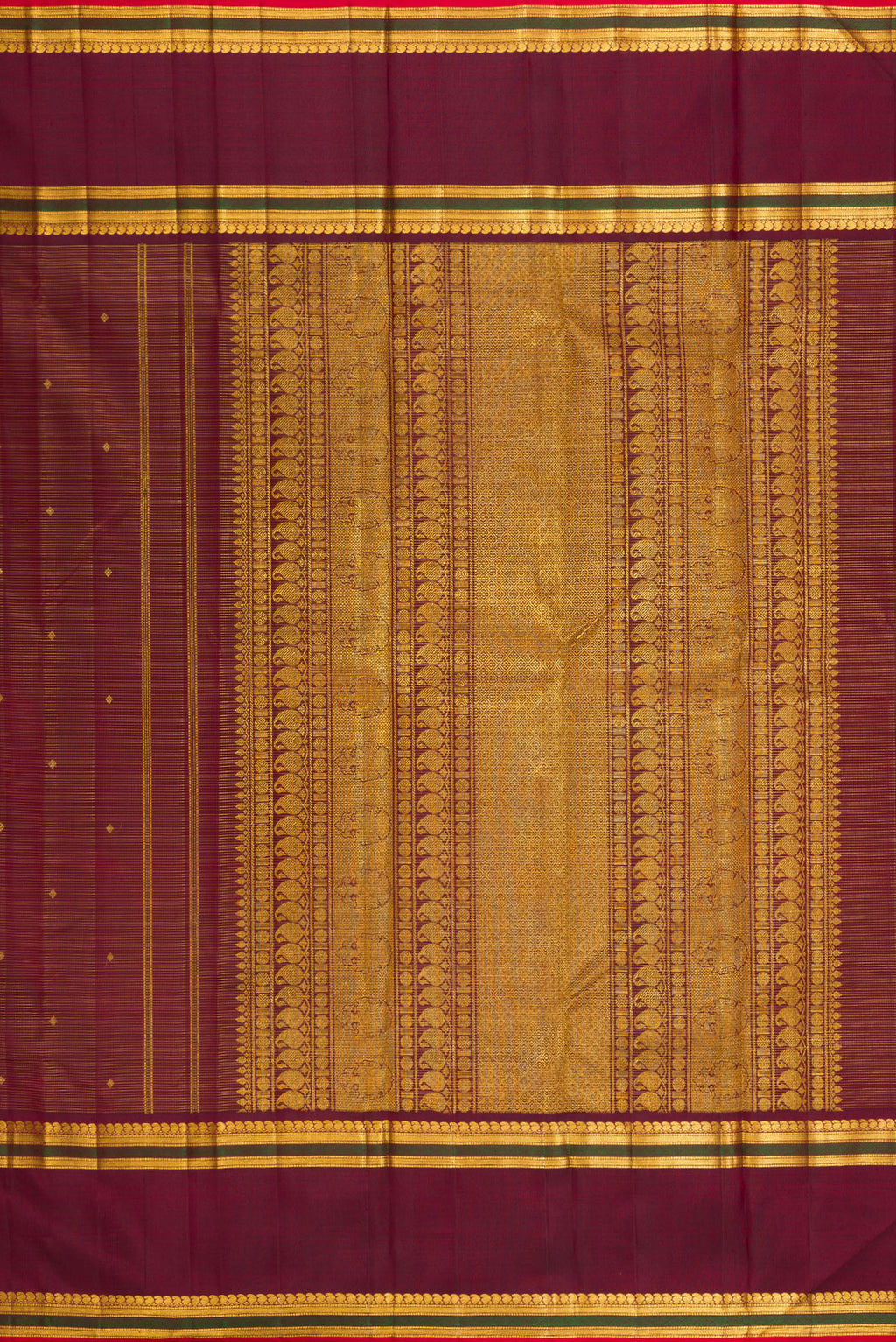 Close up image of the pallu of Pure Silk Maroon Kanjivaram Saree with Stripes on the body and Zari Border. 
