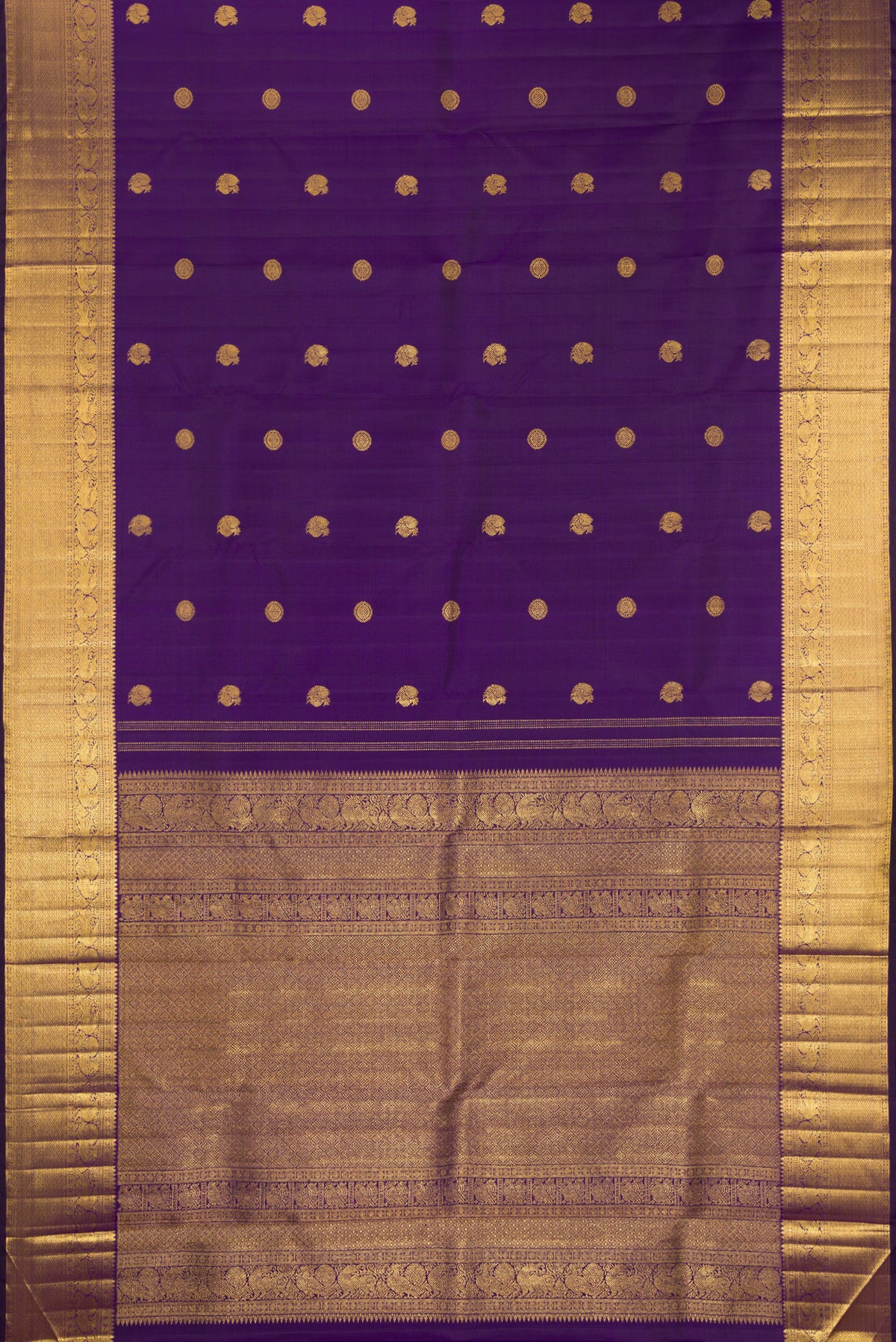 Flat view of Pure Silk Violet Kanjivaram Saree with Zari Butta on the body and Zari Border. 