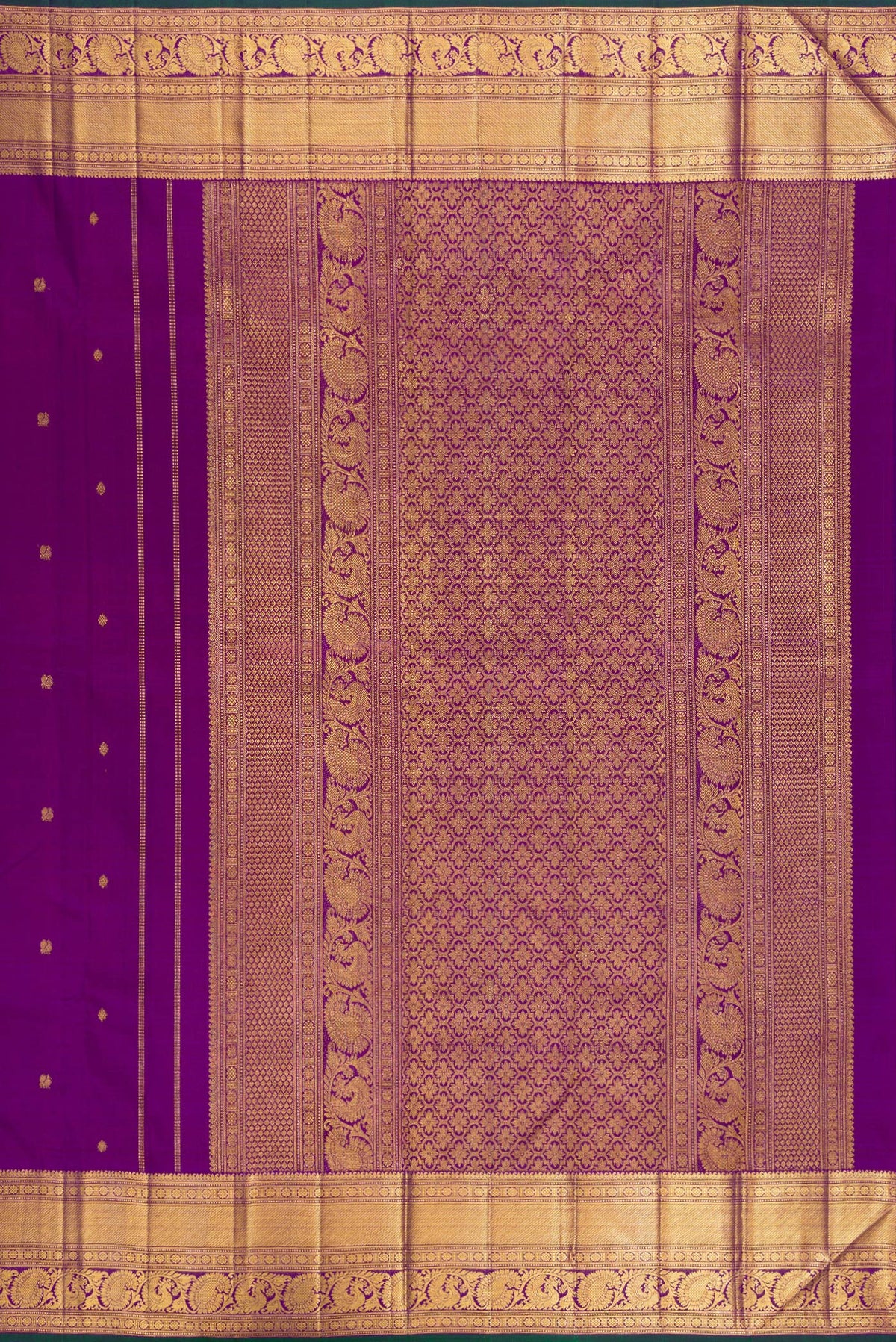 Close up image of the pallu of Pure Silk Purple Kanjivaram Saree with Zari Butta on the body and Zari Border. 