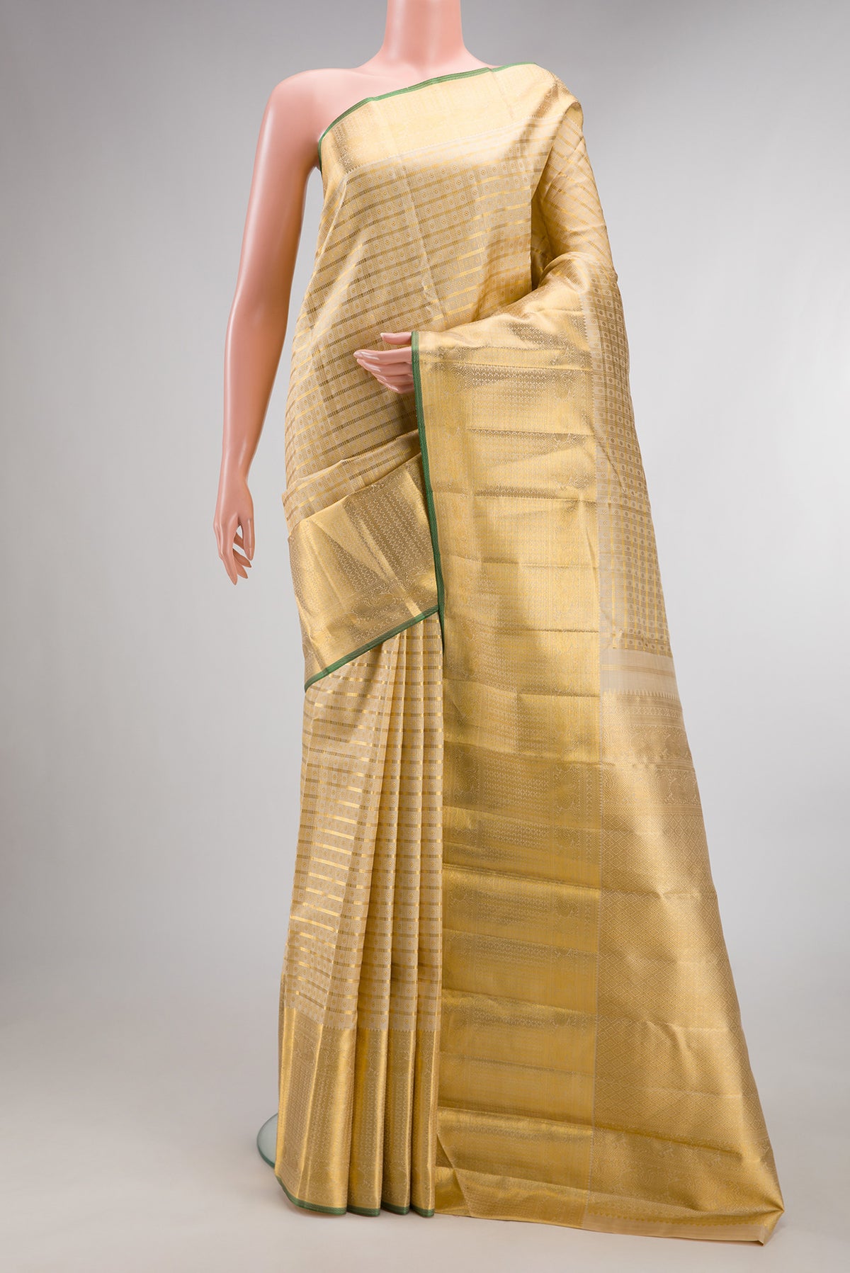 Pure Silk Sandal Dual Tone Kanchipuram Saree with Zari Brocade on the body and Zari Border.  displayed on a mannequin
