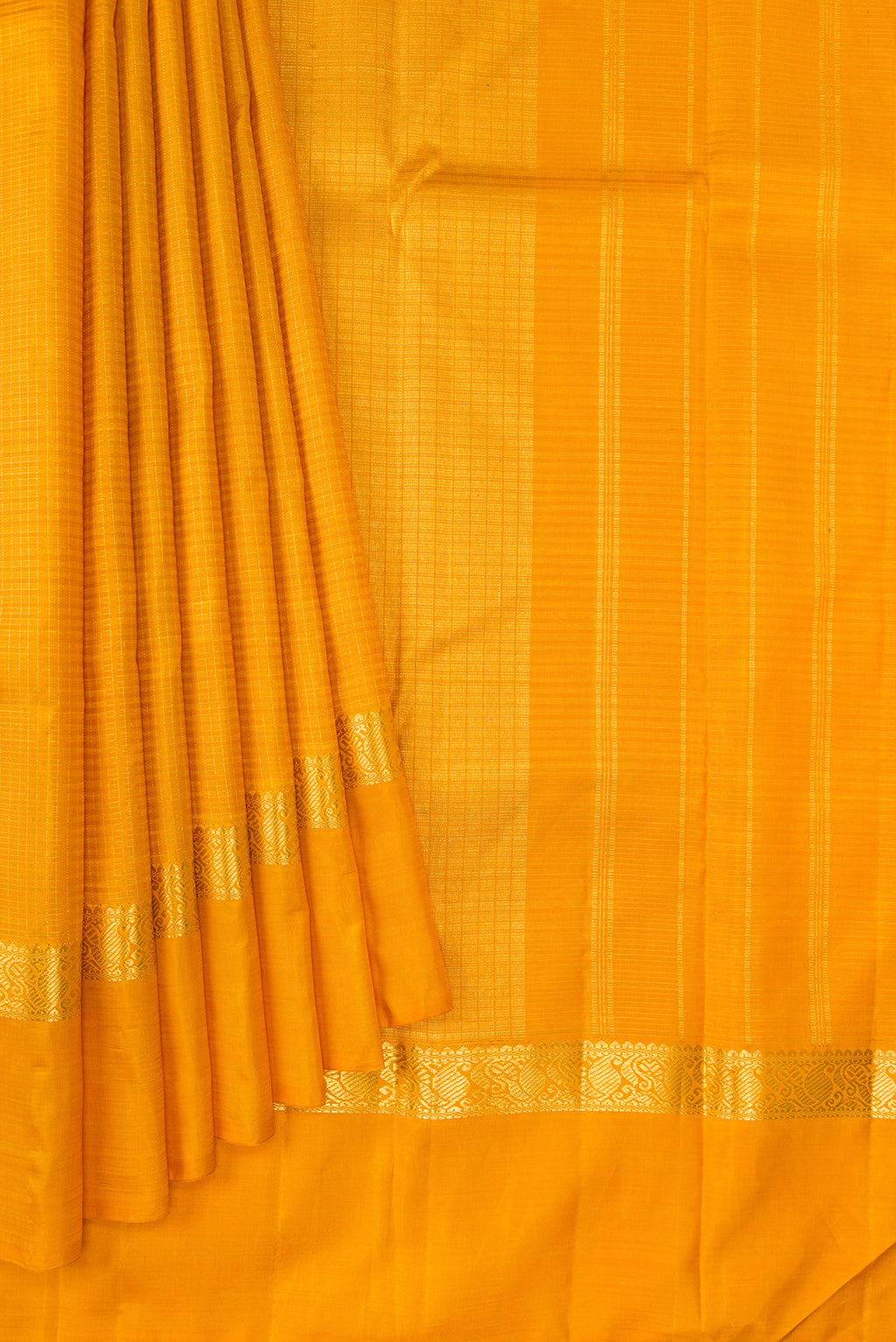 Pleats and pallu of Pure Silk Mustard Kanjivaram Saree with Checked design on the body and Zari Border. 