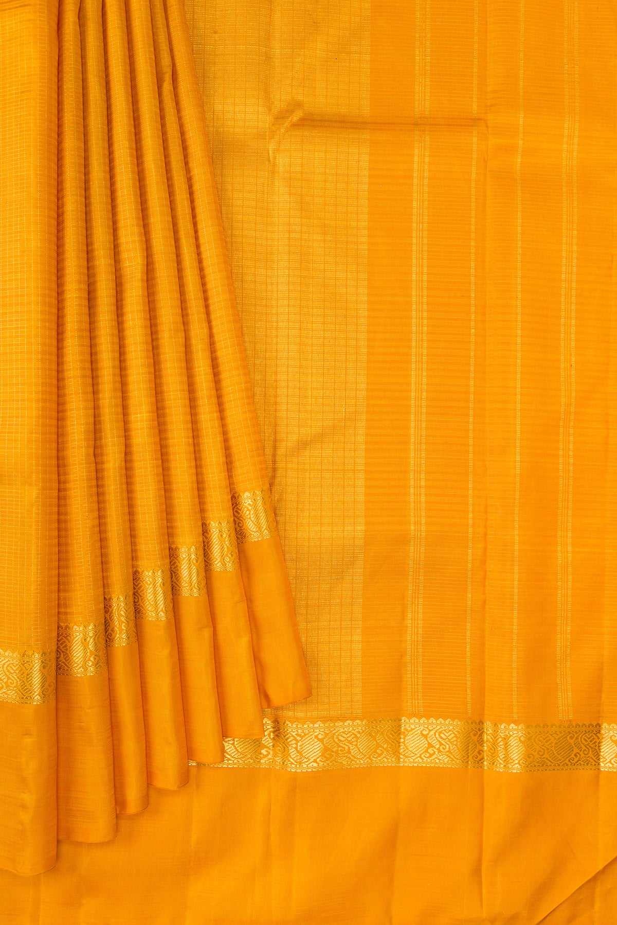 Pleats and pallu of Pure Silk Mustard Kanjivaram Saree with Checked design on the body and Zari Border. 