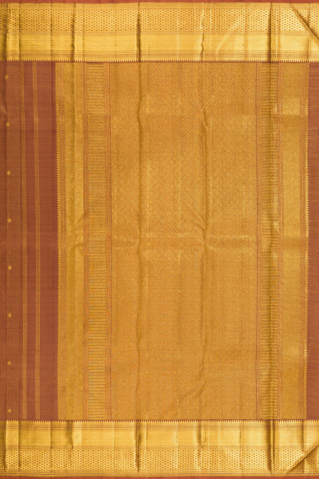 Close up image of the pallu of Pure Silk Brown Kanchipuram Saree with Zari Butta on the body and Zari Border. 