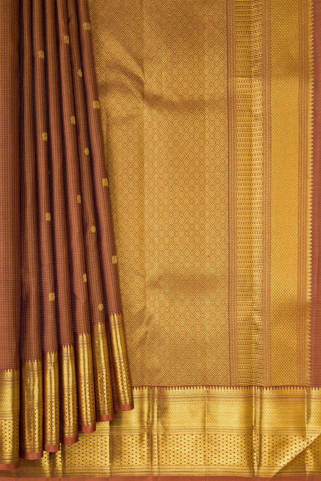 Pleats and pallu of Pure Silk Brown Kanchipuram Saree with Zari Butta on the body and Zari Border. 