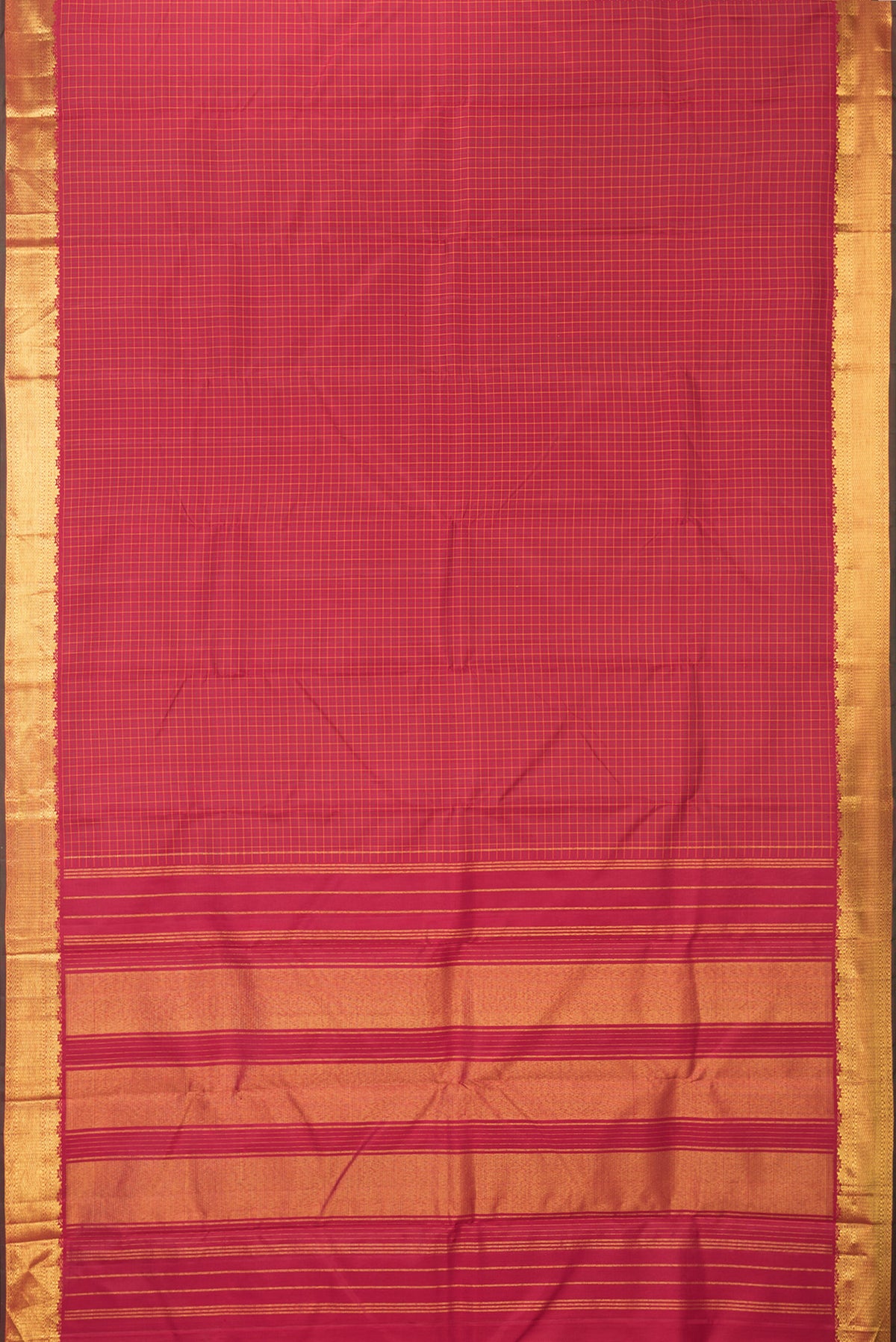 Flat view of Pure Silk Deep Red Kanchipuram Saree with Checked design on the body and Zari Border. 
