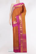 Pure Silk Mustard Dual Tone Kanjivaram Saree with Zari Butta on the body and Zari Border.  displayed on a mannequin