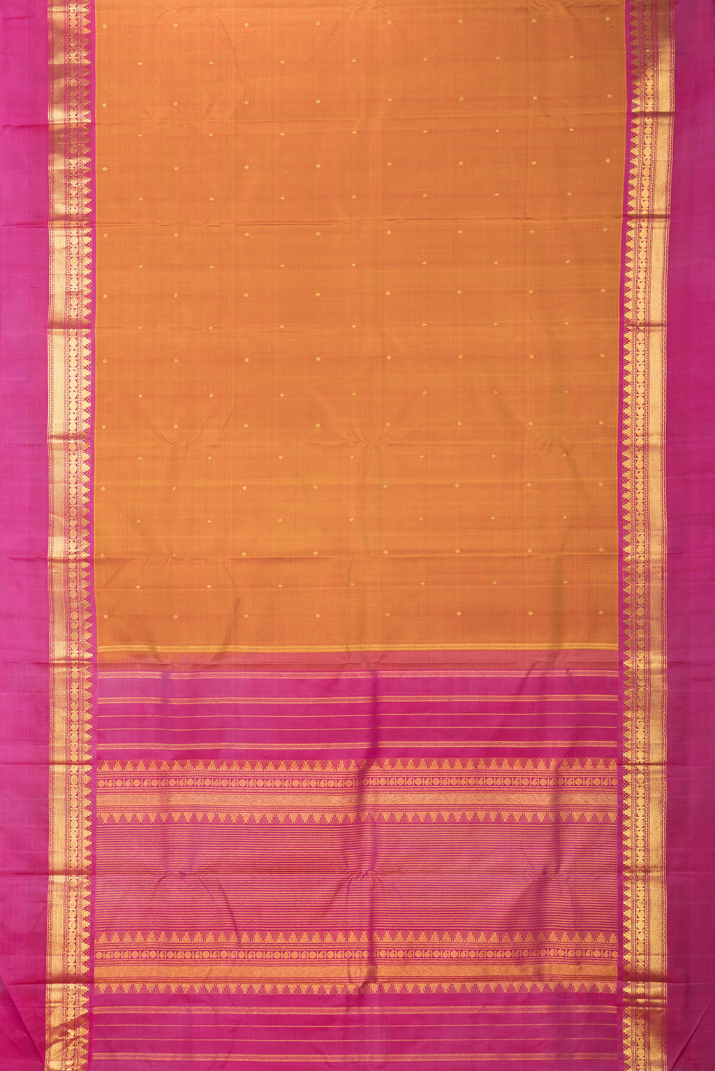 Flat view of Pure Silk Mustard Dual Tone Kanjivaram Saree with Zari Butta on the body and Zari Border. 
