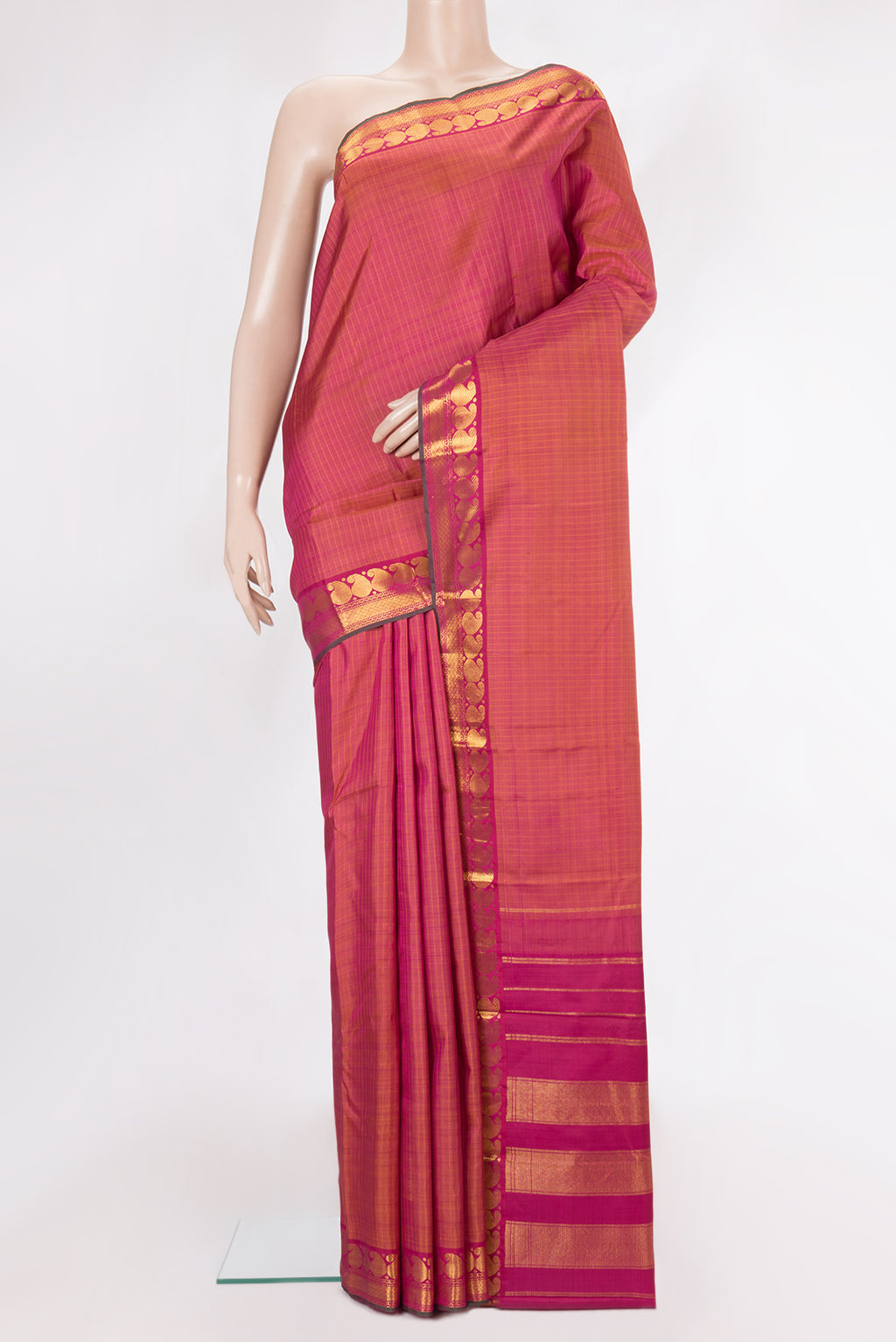 Pure Silk Pink Dual Tone Kanchipuram Saree with Checked design on the body and Zari Border.  displayed on a mannequin