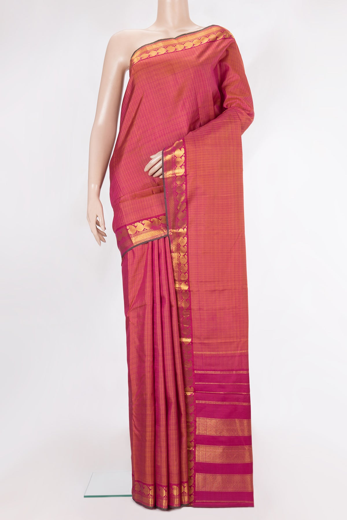 Pure Silk Pink Dual Tone Kanchipuram Saree with Checked design on the body and Zari Border.  displayed on a mannequin