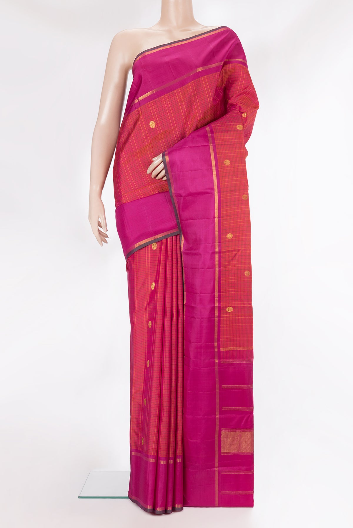 Pure Silk Coral Dual Tone Kanjivaram Saree with Checked design on the body and Zari Border.  displayed on a mannequin
