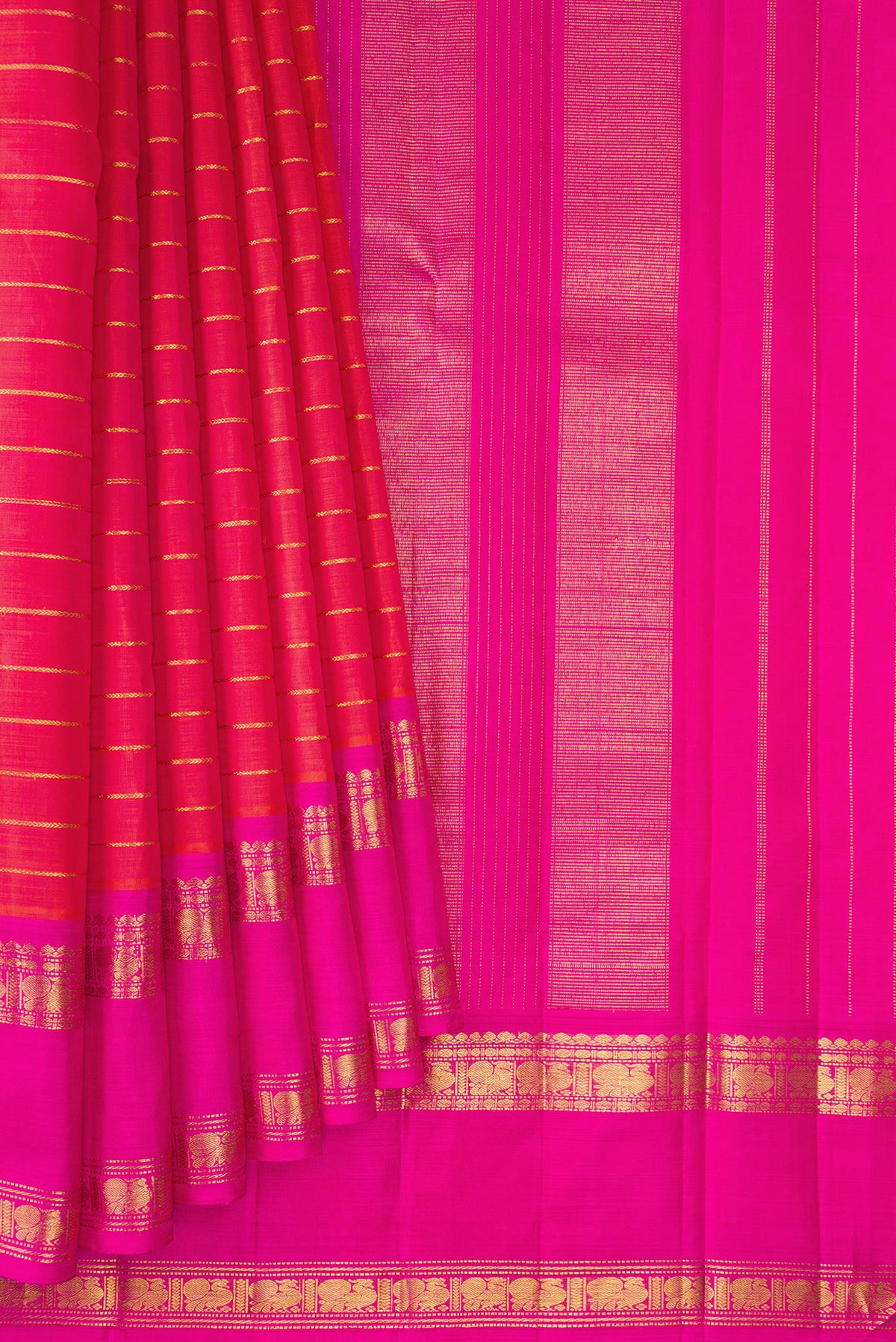 Pleats and pallu of Pure Silk Coral Dual Tone Kanjivaram Saree with Veldhari on the body and Ganga Jamuna Border. 
