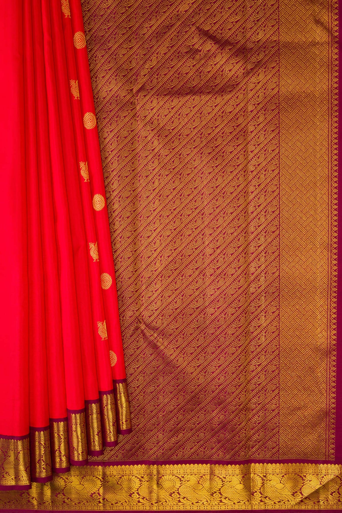 Pleats and pallu of Pure Silk Red Kanjivaram Saree with Zari Butta on the body and Zari Border. 
