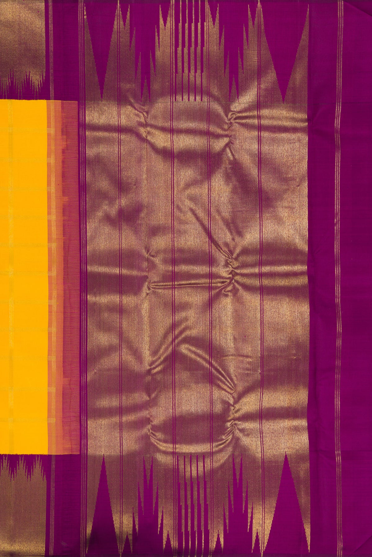 Close up image of the pallu of Pure Silk Pure Zari Yellow Kanjivaram Saree with Checked design on the body and Temple Border. 