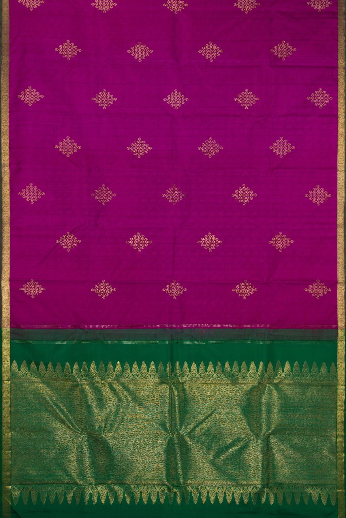 Flat view of Pure Silk Magenta Kanjivaram Saree with Jacquard With Zari Butta on the body and Zari Border. 