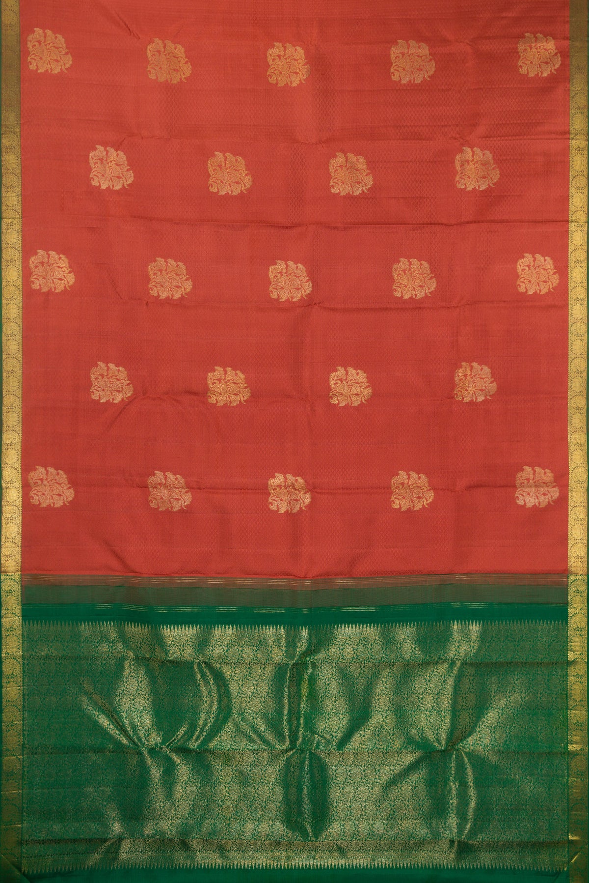 Flat view of Pure Silk Rust Kanjivaram Saree with Jacquard With Zari Butta on the body and Zari Border. 