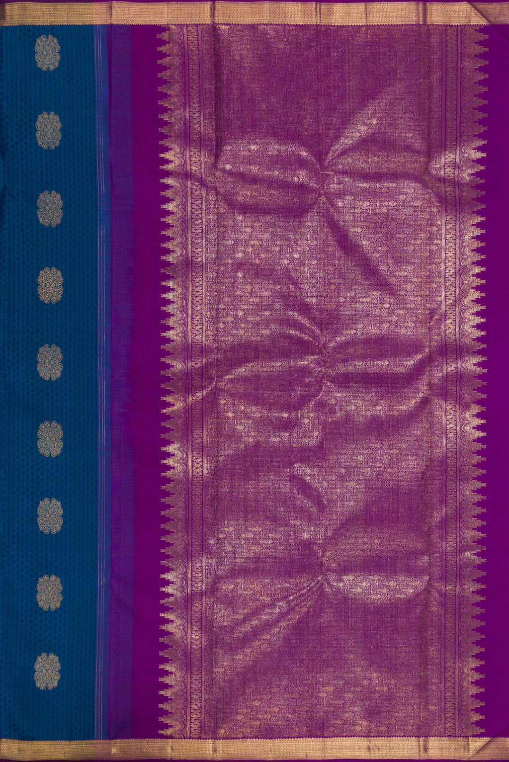 Close up image of the pallu of Pure Silk Peacock Blue Kanjivaram Saree with Jacquard With Zari Butta on the body and Zari Border. 