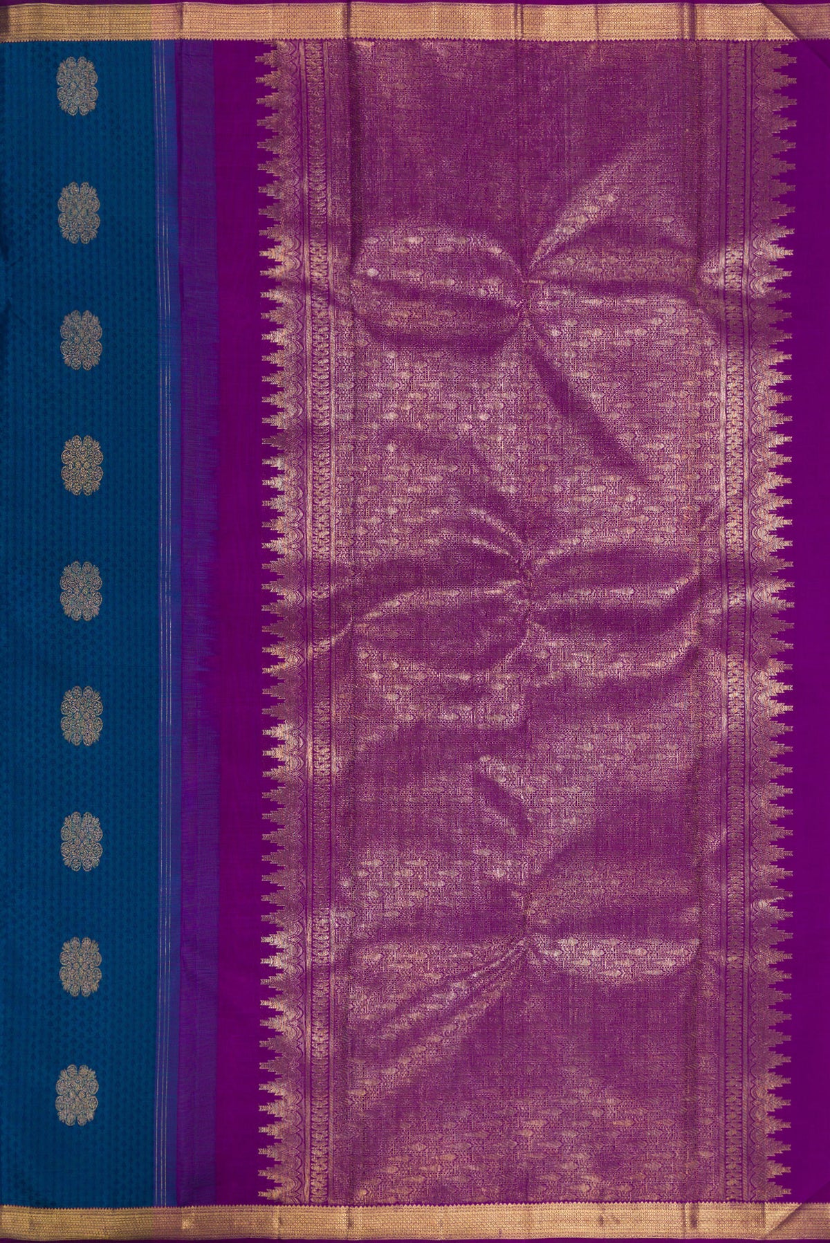 Close up image of the pallu of Pure Silk Peacock Blue Kanjivaram Saree with Jacquard With Zari Butta on the body and Zari Border. 
