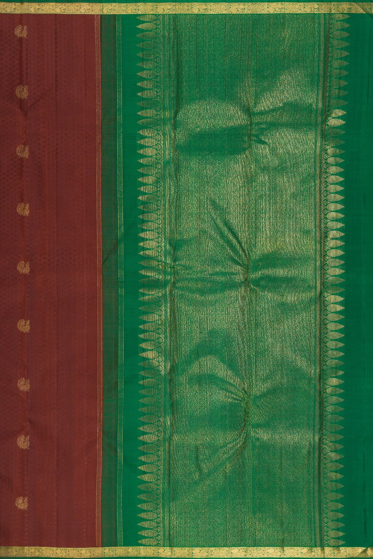 Close up image of the pallu of Pure Silk Brown Kanjivaram Saree with Jacquard With Zari Butta on the body and Zari Border. 