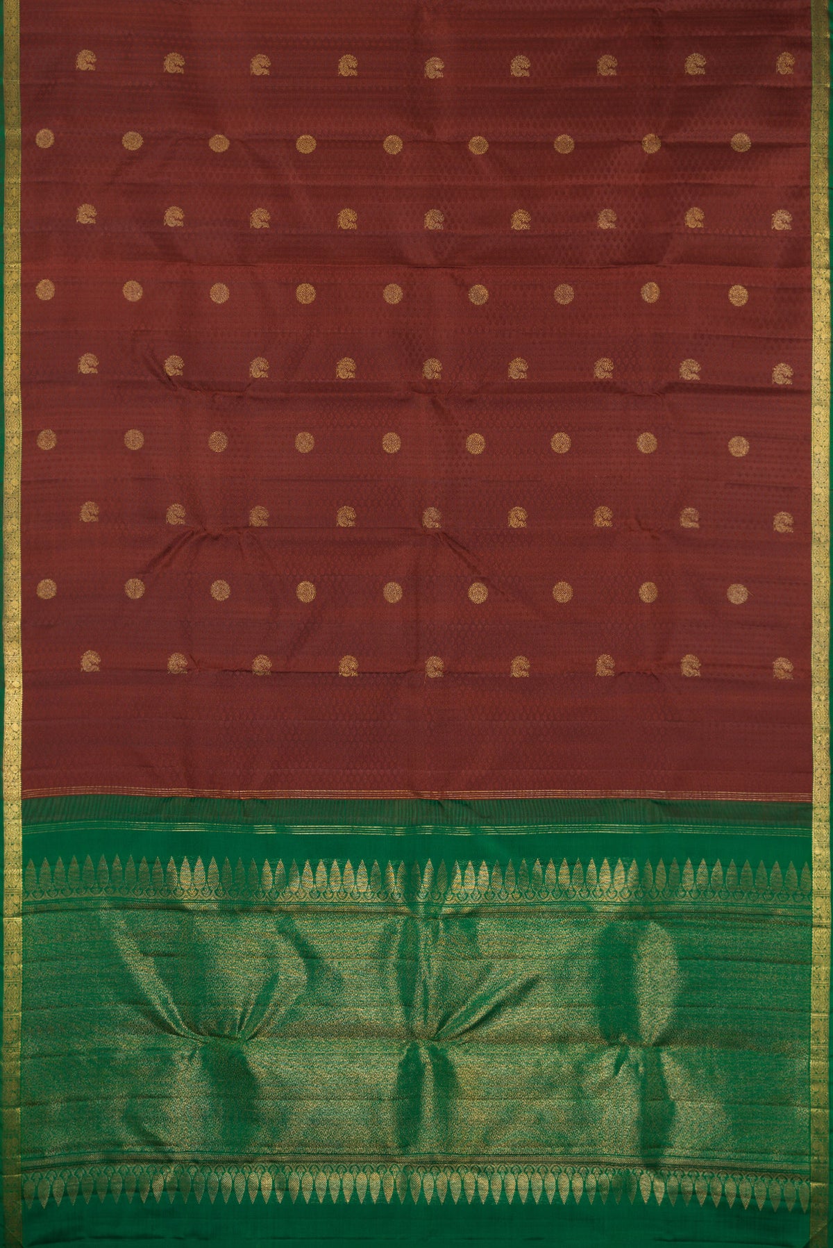 Flat view of Pure Silk Brown Kanjivaram Saree with Jacquard With Zari Butta on the body and Zari Border. 