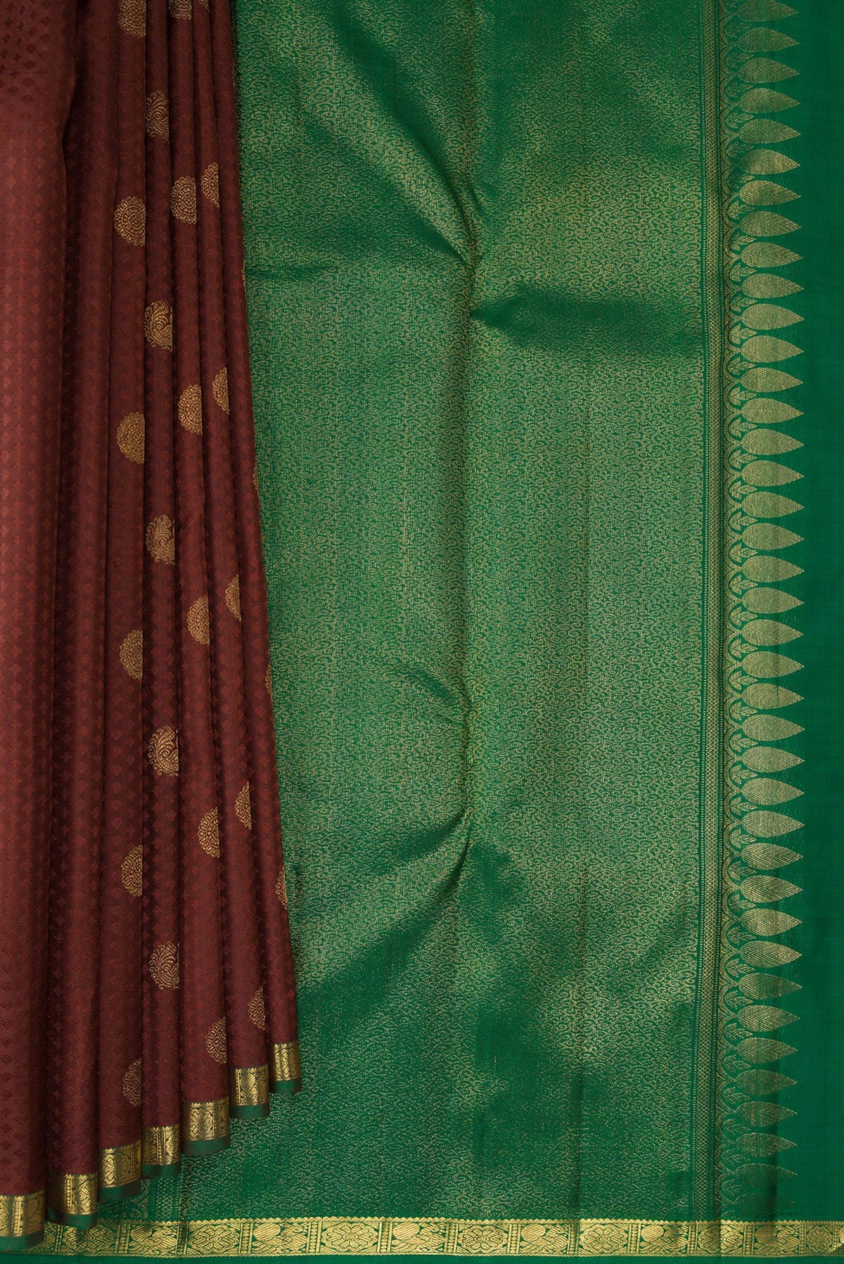 Pleats and pallu of Pure Silk Brown Kanjivaram Saree with Jacquard With Zari Butta on the body and Zari Border. 
