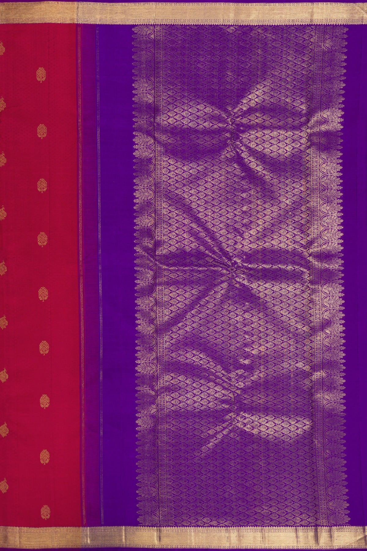 Close up image of the pallu of Pure Silk Red Kanjivaram Saree with Jacquard With Zari Butta on the body and Zari Border. 