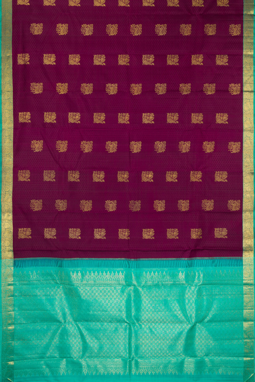 Flat view of Pure Silk Maroon Kanjivaram Saree with Jacquard With Zari Butta on the body and Zari Border. 