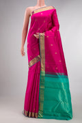 Pure Silk Pink Kanchipuram Saree with Jacquard With Zari Butta on the body and Zari Border.  displayed on a mannequin