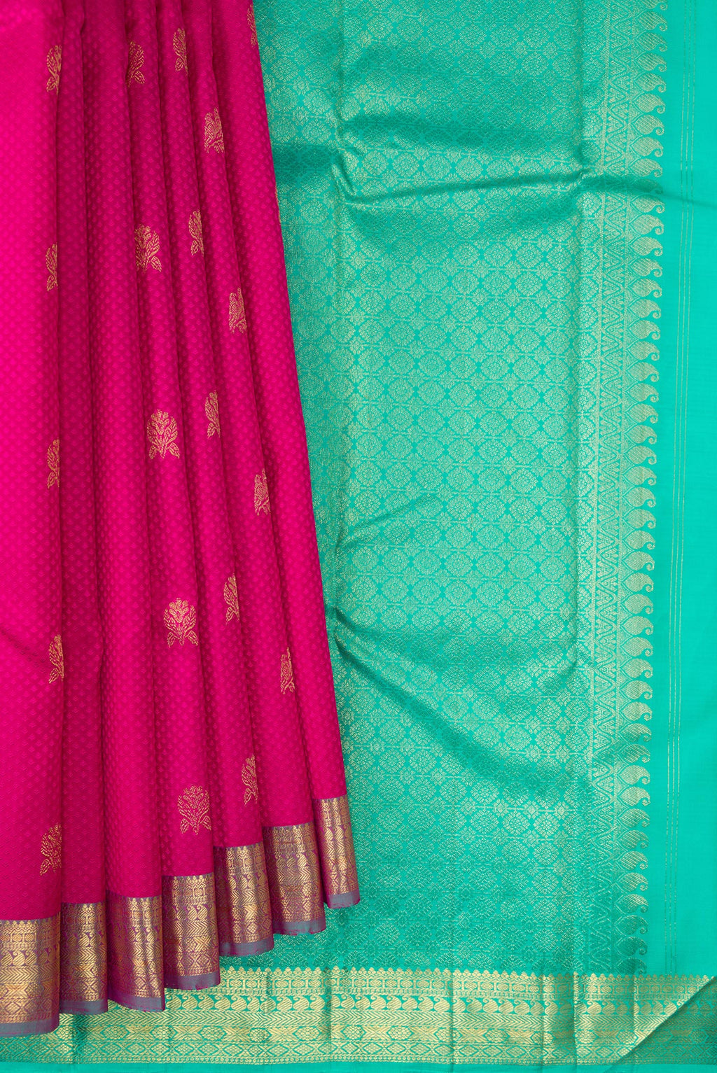 Pleats and pallu of Pure Silk Pink Kanchipuram Saree with Jacquard With Zari Butta on the body and Zari Border. 