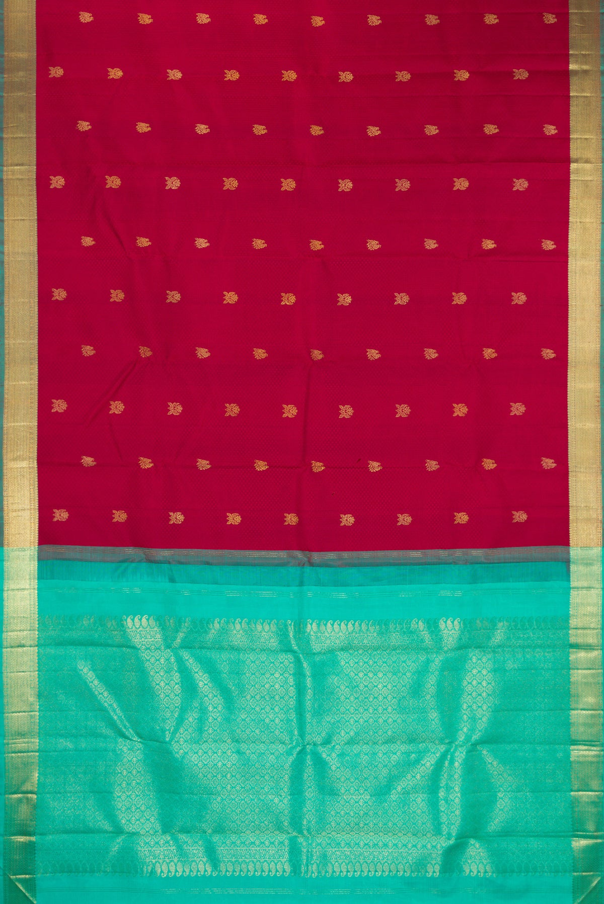 Flat view of Pure Silk Deep Red Kanchipuram Saree with Jacquard With Zari Butta on the body and Zari Border. 