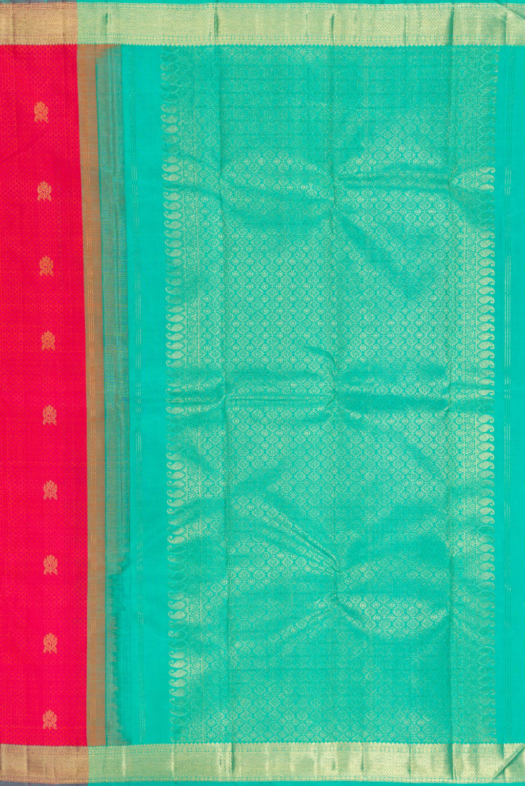 Close up image of the pallu of Pure Silk Coral Kanchipuram Saree with Jacquard With Zari Butta on the body and Zari Border. 