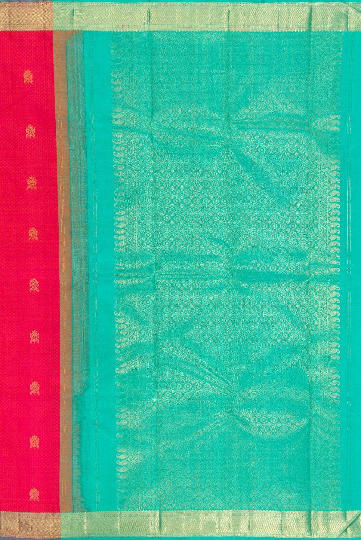 Close up image of the pallu of Pure Silk Coral Kanchipuram Saree with Jacquard With Zari Butta on the body and Zari Border. 