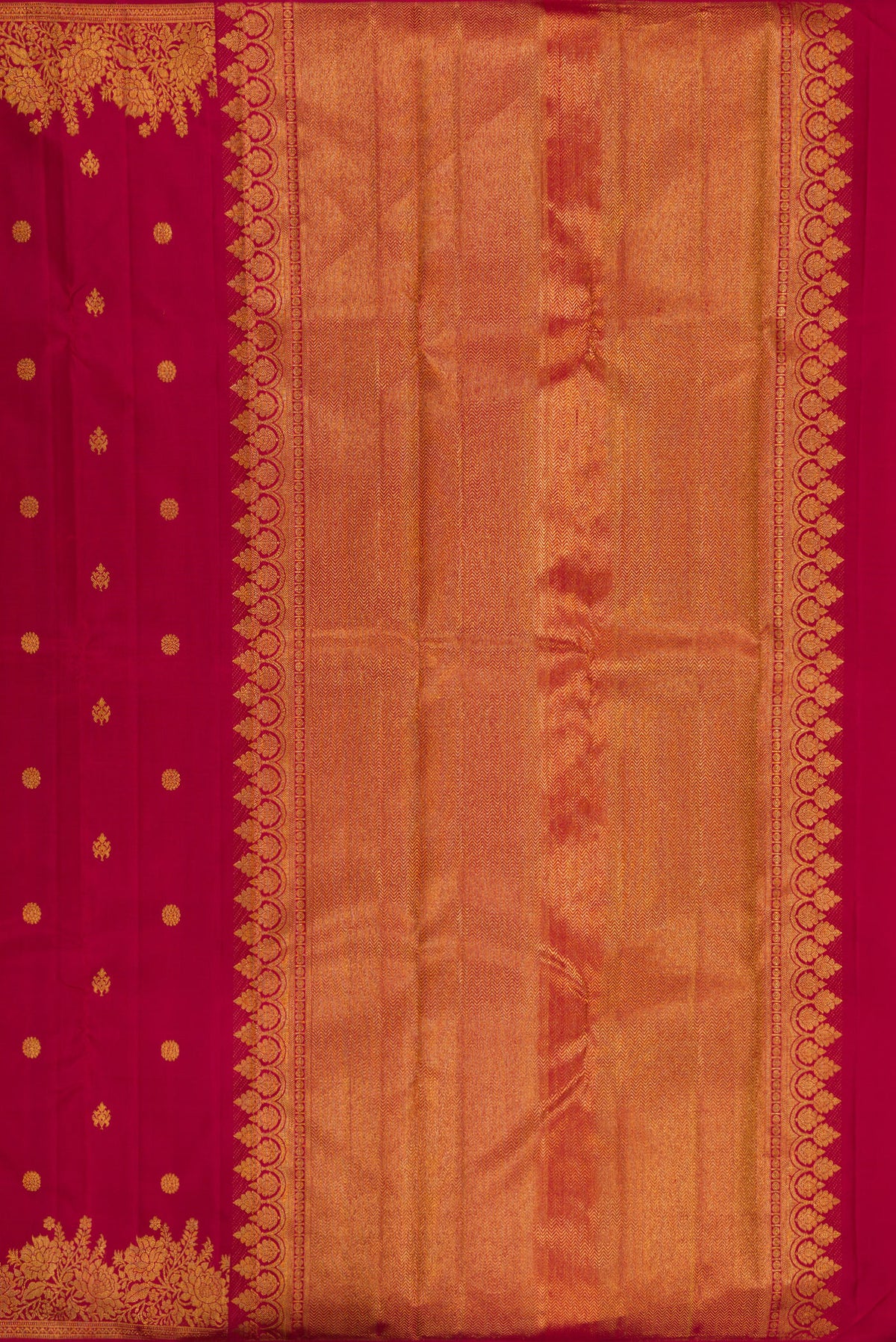 Close up image of the pallu of Pure Silk Maroon Kanjivaram Saree with Zari Butta on the body and Fancy Border. 