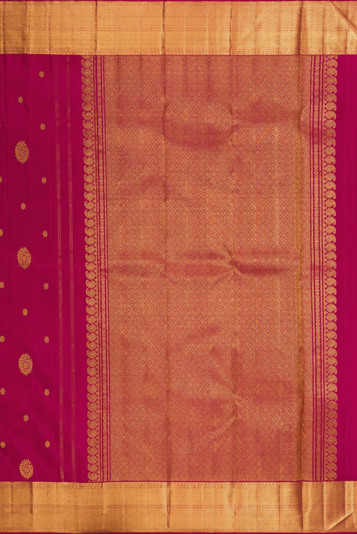 Close up image of the pallu of Pure Silk Maroon Kanjivaram Saree with Zari Butta on the body and Zari Border. 
