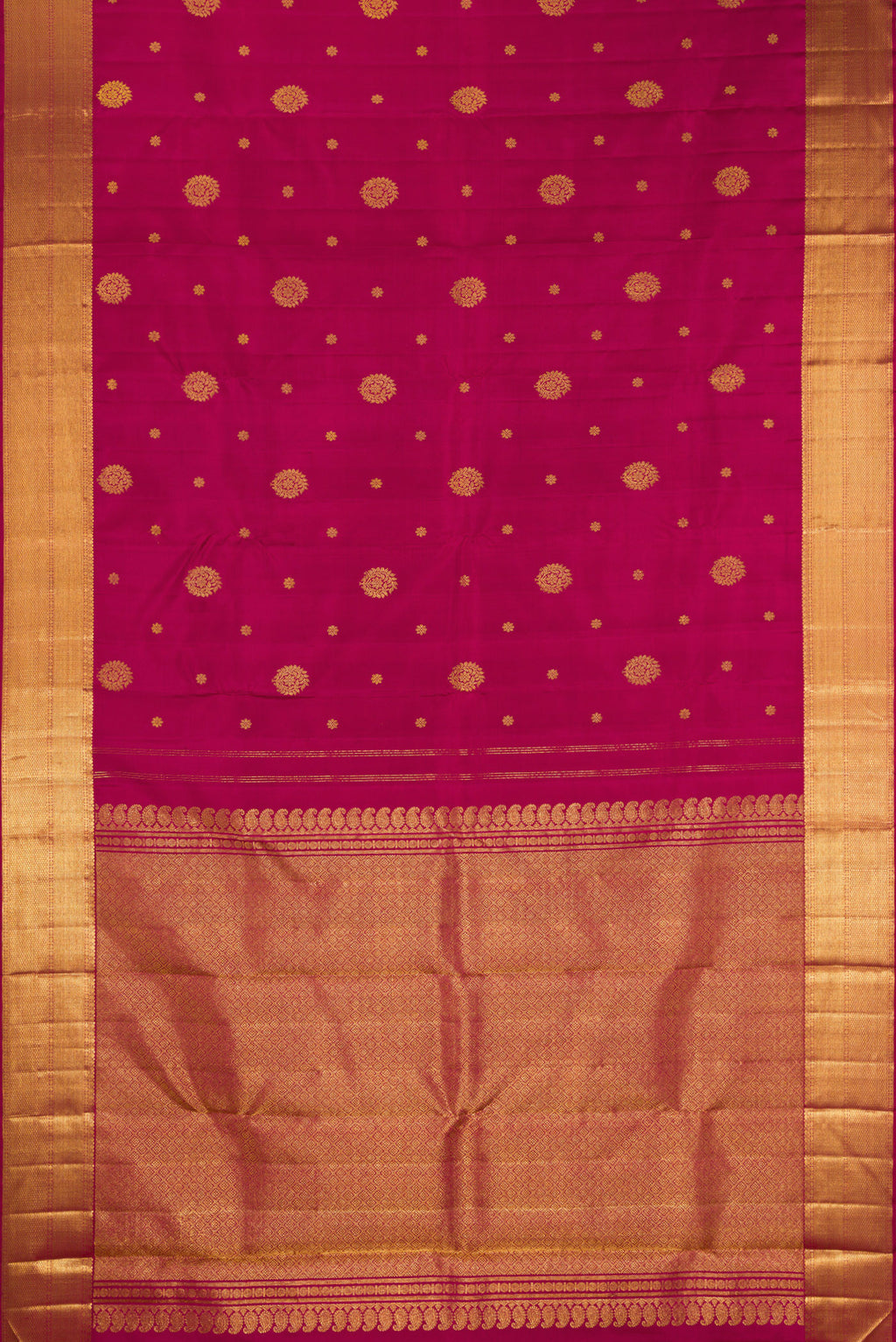 Flat view of Pure Silk Maroon Kanjivaram Saree with Zari Butta on the body and Zari Border. 