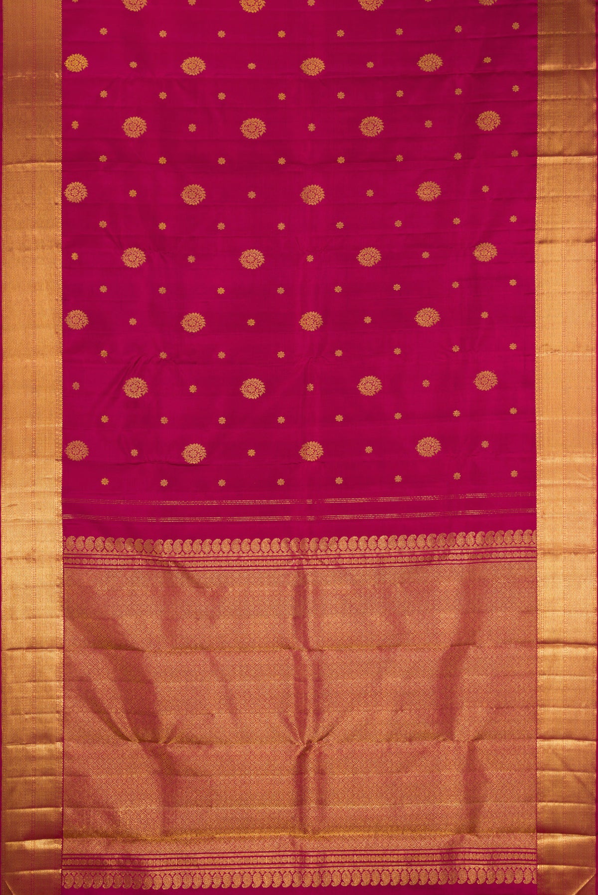 Flat view of Pure Silk Maroon Kanjivaram Saree with Zari Butta on the body and Zari Border. 