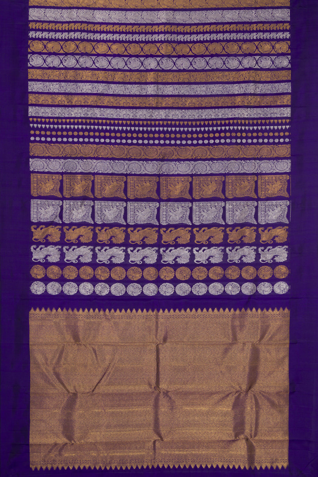 Flat view of Pure Silk Dark Blue Kanjivaram Saree with Zari Butta on the body and Plain Border. 