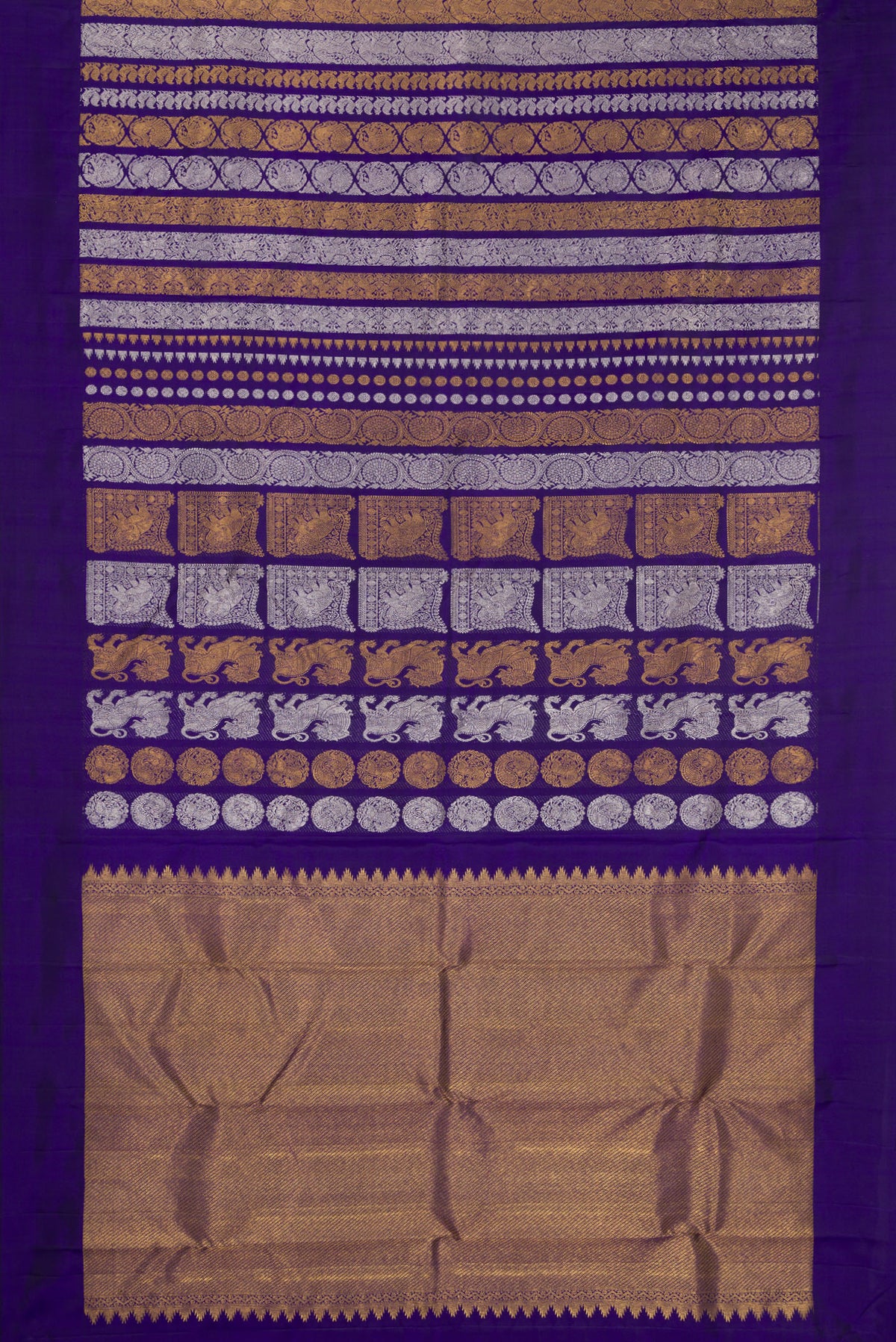 Flat view of Pure Silk Dark Blue Kanjivaram Saree with Zari Butta on the body and Plain Border. 