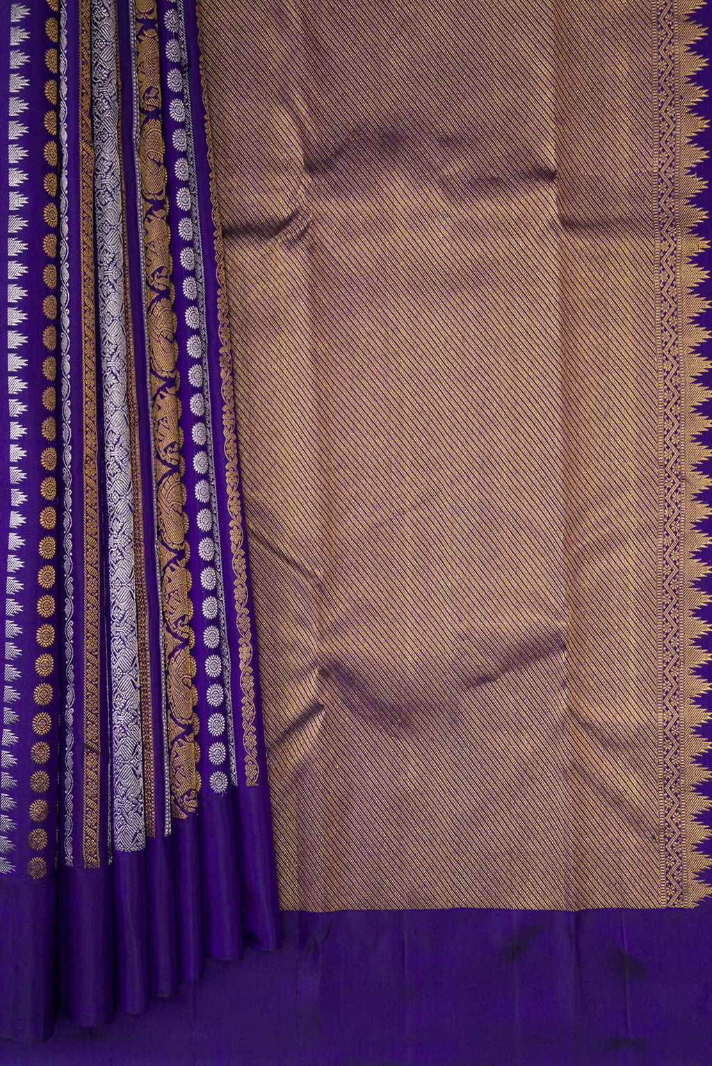 Pleats and pallu of Pure Silk Dark Blue Kanjivaram Saree with Zari Butta on the body and Plain Border. 