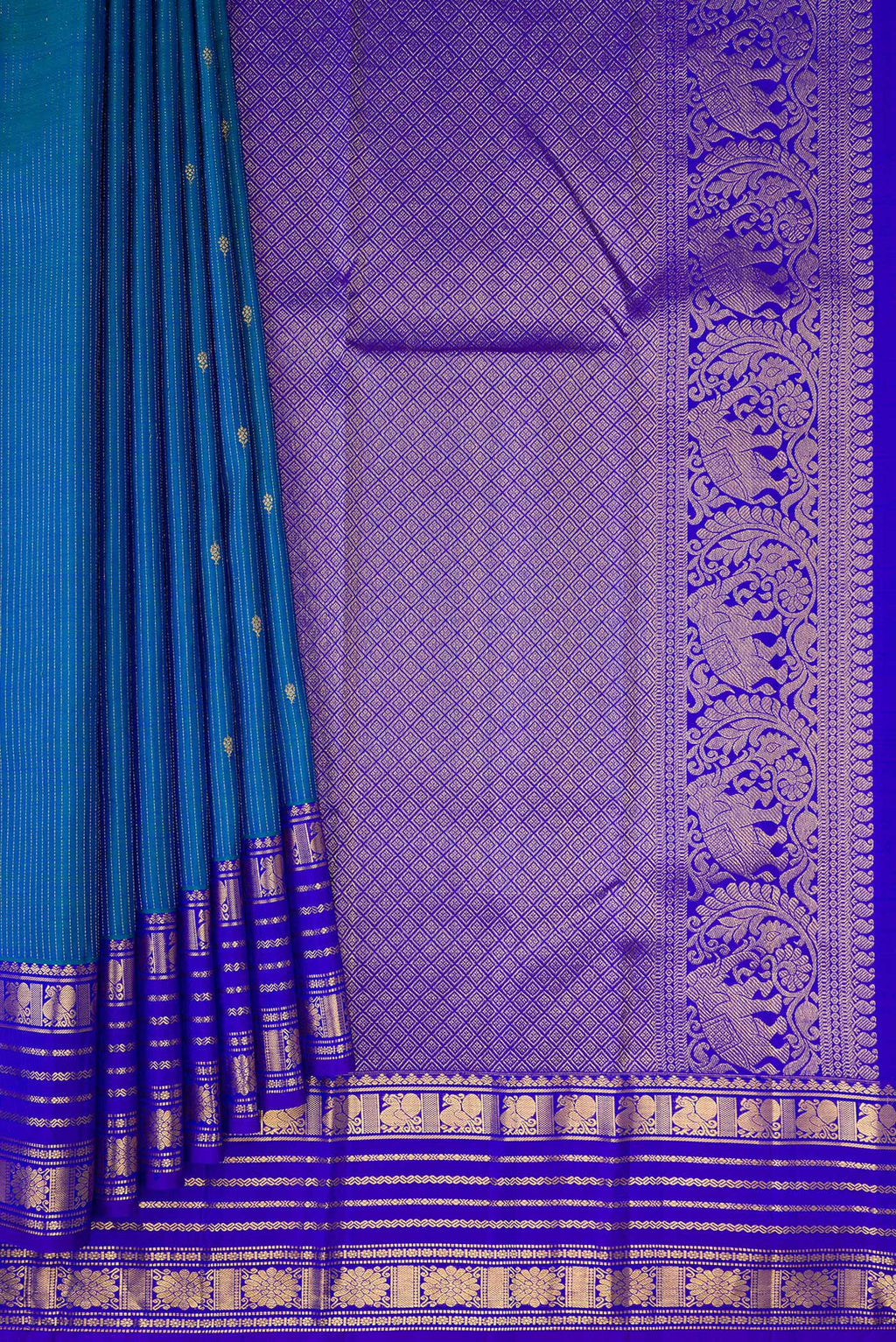 Pleats and pallu of Pure Silk Peacock Blue Dual Tone Kanjivaram Saree with Stripes on the body and Zari Border. 